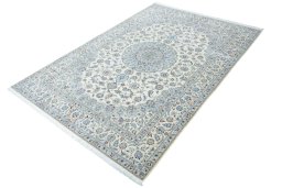 Corner detail of New Nain rug showing border pattern and Cork pile