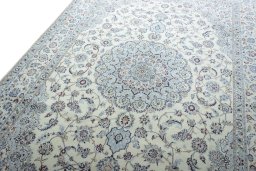 Backside of handmade New Nain rug showing knot structure and weave density