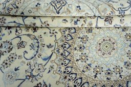 Close-up detail of New Nain rug from Iran / Persia showing Wool weave