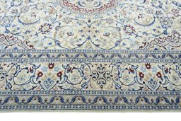 Corner detail of 2000s Nain rug showing border pattern and Wool pile