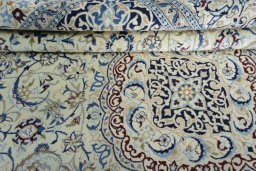 Close-up detail of 2000s Nain rug from Iran / Persia showing Wool weave