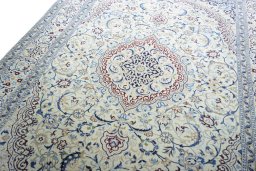 Backside of handmade 2000s Nain rug showing knot structure and weave density