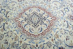 Central medallion detail of 2000s Nain rug from Iran / Persia