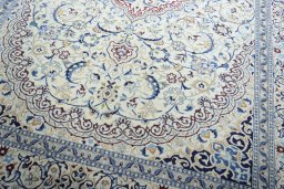 Close-up detail of 2000s Nain rug from Iran / Persia showing Wool weave