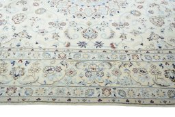 Corner detail of New Nain rug showing border pattern and Wool pile