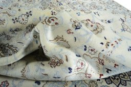 Surface texture of New Nain rug with natural Wool and intricate pattern
