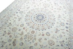 Backside of handmade New Nain rug showing knot structure and weave density