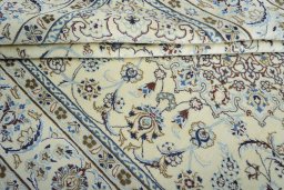 Close-up detail of New Nain rug from Iran / Persia showing Wool weave