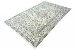Corner detail of New Nain rug showing border pattern and Wool pile