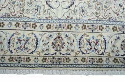 Full view of New Nain rug from Iran / Persia, 331 × 203 cm in Beige tones