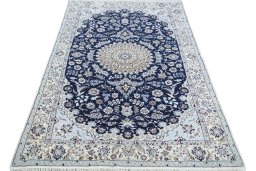 Surface texture of New Nain rug with natural Wool and intricate pattern