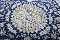 Central medallion detail of New Nain rug from Iran / Persia