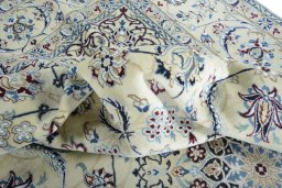 Surface texture of New Nain rug with natural Wool and intricate pattern