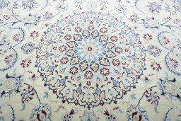 Central medallion detail of New Nain rug from Iran / Persia