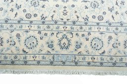 Full view of New Nain rug from Iran / Persia, 302 × 197 cm in Beige tones
