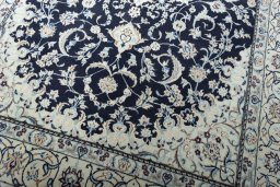 Close-up detail of New Nain rug from Iran / Persia showing Wool weave