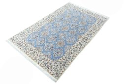 Corner detail of New Nain rug showing border pattern and Cork pile