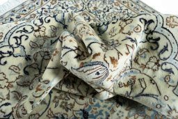 Surface texture of New Nain rug with natural Wool and intricate pattern