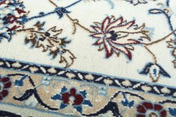 Close-up detail of New Nain rug from Iran / Persia showing Wool weave