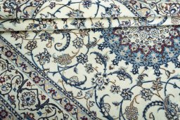 Surface texture of New Nain rug with natural Wool and intricate pattern