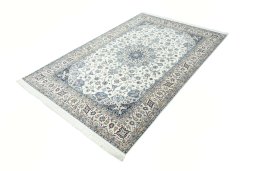 Corner detail of New Nain rug showing border pattern and Cork pile
