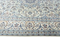 Corner detail of New Nain rug showing border pattern and Wool pile