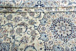 Close-up detail of New Nain rug from Iran / Persia showing Wool weave