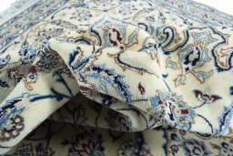 Surface texture of New Nain rug with natural Wool and intricate pattern