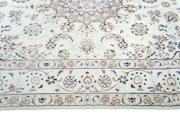 Corner detail of New Nain rug showing border pattern and Wool pile