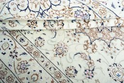 Close-up detail of New Nain rug from Iran / Persia showing Wool weave