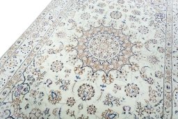 Backside of handmade New Nain rug showing knot structure and weave density