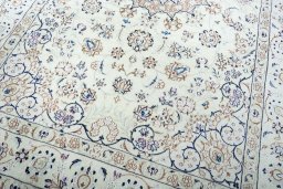 Close-up detail of New Nain rug from Iran / Persia showing Wool weave