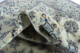 Surface texture of New Nain rug with natural Wool and intricate pattern