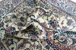 Surface texture of New Nain rug with natural Wool and intricate pattern