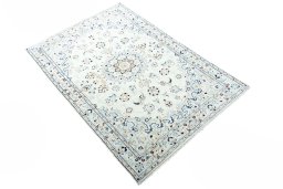 Close-up detail of New Nain rug from Iran / Persia showing Wool weave