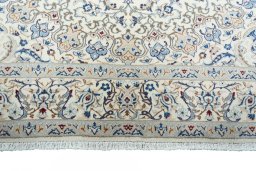 Full view of New Nain rug from Iran / Persia, 325 × 209 cm in Beige tones