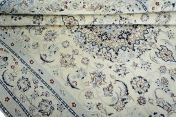 Close-up detail of New Nain rug from Iran / Persia showing Wool weave