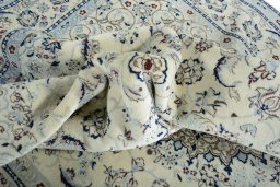 Surface texture of New Nain rug with natural Wool and intricate pattern
