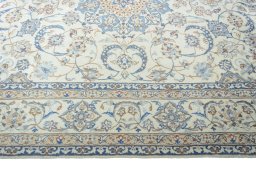 Corner detail of New Nain rug showing border pattern and Wool pile