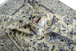 Surface texture of New Nain rug with natural Wool and intricate pattern