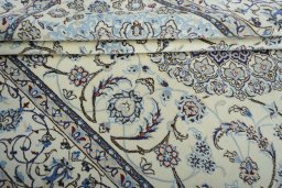 Close-up detail of New Nain rug from Iran / Persia showing Wool weave