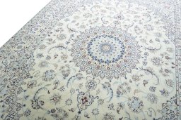Backside of handmade New Nain rug showing knot structure and weave density