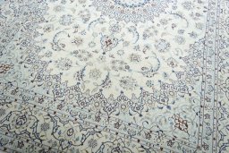 Close-up detail of New Nain rug from Iran / Persia showing Wool weave