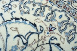 Corner detail of New Nain rug showing border pattern and Cork pile