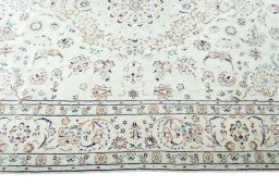 Corner detail of New Nain rug showing border pattern and Wool pile