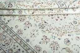 Close-up detail of New Nain rug from Iran / Persia showing Wool weave