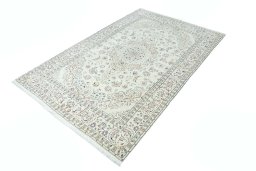 Corner detail of New Nain rug showing border pattern and Wool pile