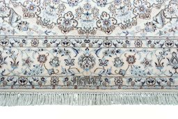 Full view of New Nain rug from Iran / Persia, 243 × 161 cm in Beige tones