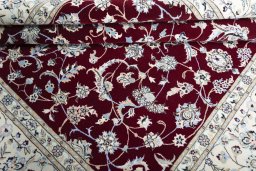 Corner detail of New Nain rug showing border pattern and Cork pile