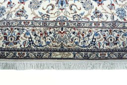 Full view of 2000s Nain rug from Iran / Persia, 262 × 165 cm in Beige tones